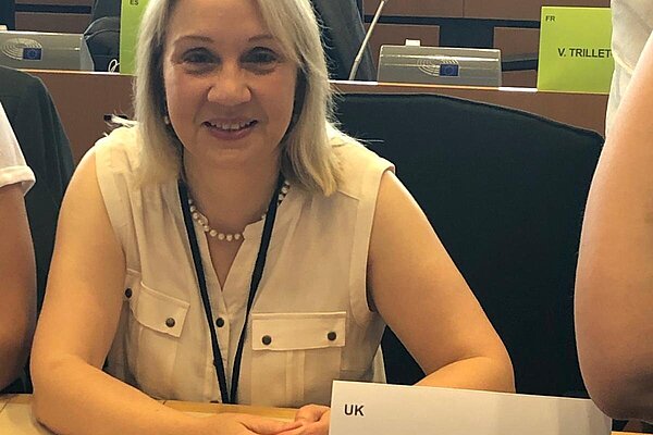 Jane sitting in the European Parliament
