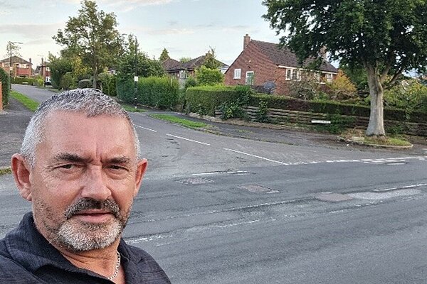 Hale Barns candidate Marc Ramsbottom next to Grove Lane Hale Barns candidate Marc Ramsbottom next to Grove Lane